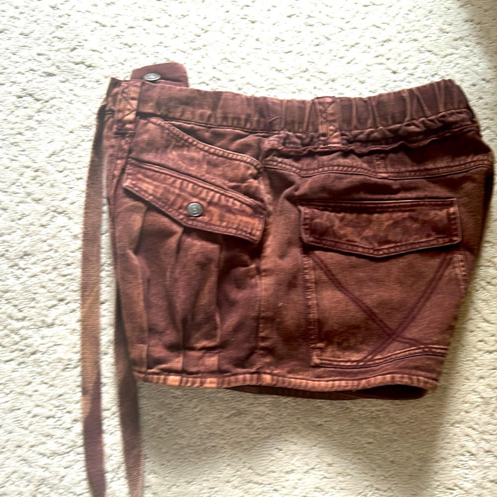 FREE PEOPLE WORN 0 times.  Too big on me.  Size M BROWN DENIM.